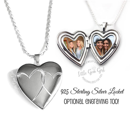 sterling silver heart locket with two interlocked hearts on the front.  locket holds two photos with optional engraving on the back.